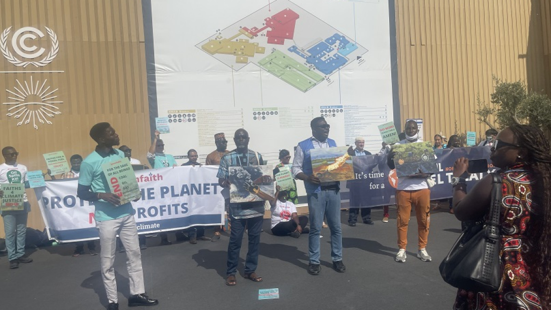 Members of GreenFaith, a multi-faith climate justice organization, demonstrate at the Action Area in Sharm El Sheikh, where the COP27 has been going on for almost two weeks