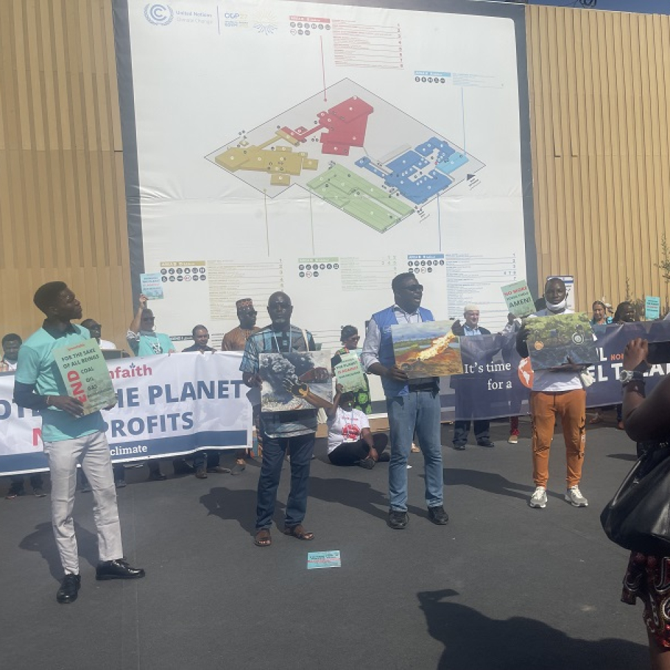 Members of GreenFaith, a multi-faith climate justice organization, demonstrate at the Action Area in Sharm El Sheikh, where the COP27 has been going on for almost two weeks