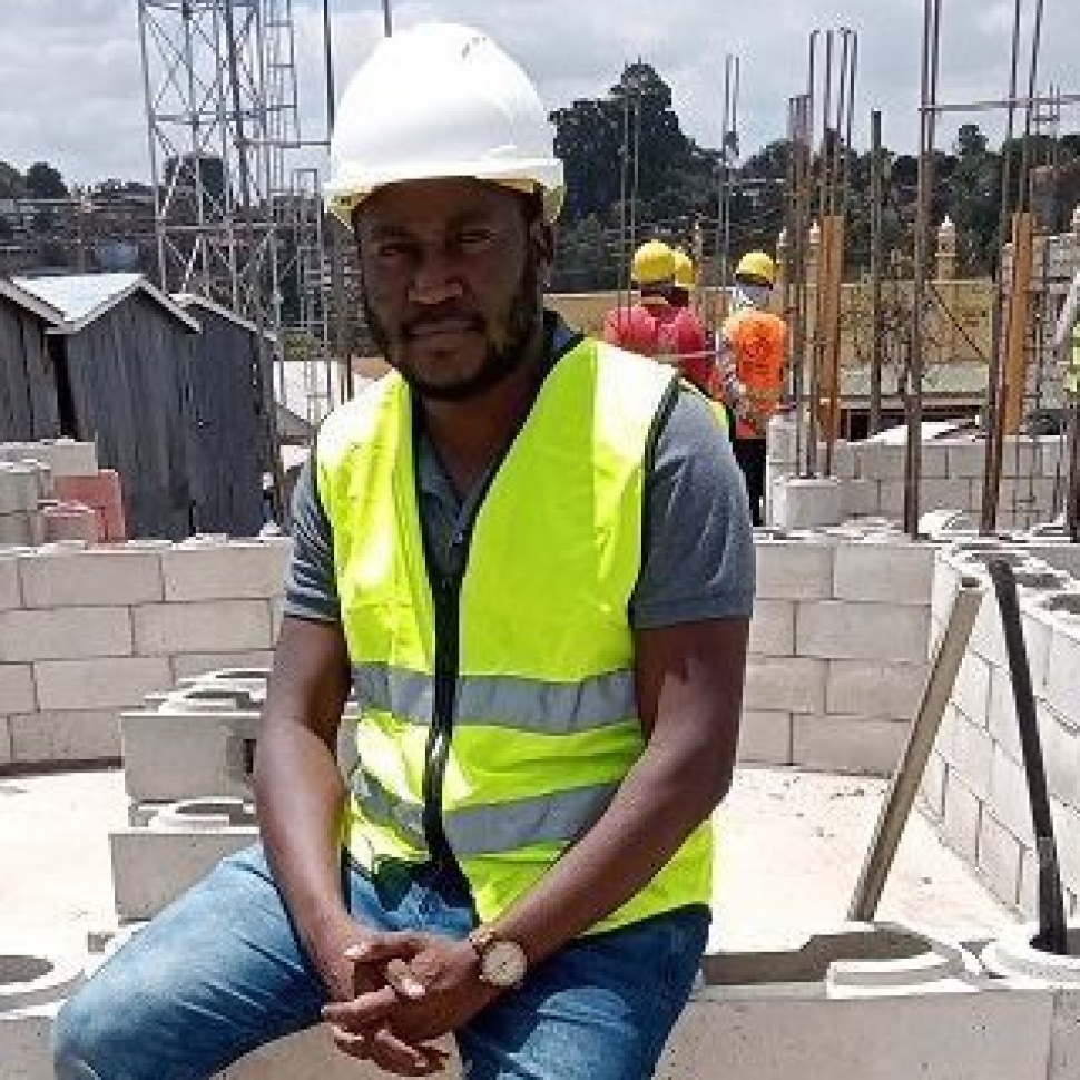 Eng Lazarus Asewe, project manager at Start Somewhere, 
inspects an ongoing construction at Kibera Slum, Nairobi.