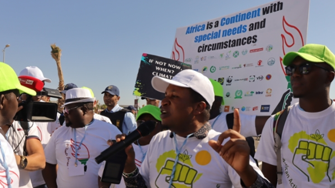 Dr Mithika Mwenda addresses climate activists during one of the 
COP27 sessions in Sharm el Sheikh, Egypt.