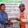MESHA member Wakio Mbogho (left) receives a certificate from Chaacha Mwita of Internews  after attending a training on reporting pandemics.
 PHOTO CREDIT | MESHA